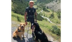 With Two Dogs By His Side, Paralympic Athlete Reaches New Heights