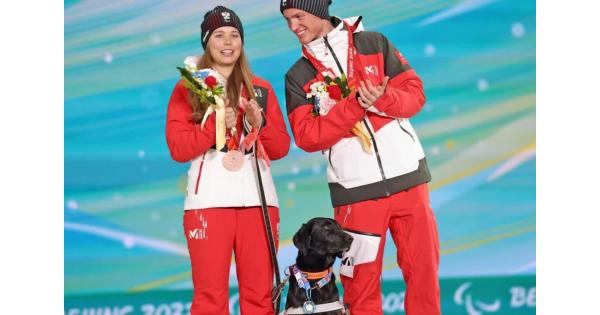 Guide Dog Receives Olympic Medal On Behalf of Blind Owner